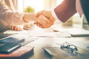 Handshake after a business agreement
